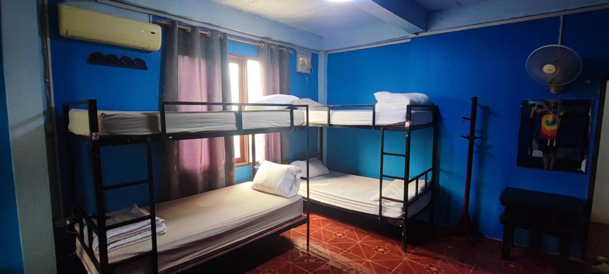 Blue Sunset Hostel Vang Vieng Quarto foto